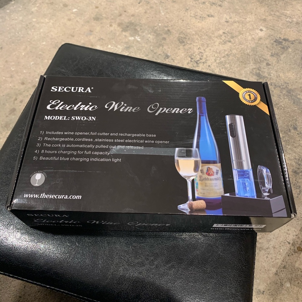 BRAND NEW SECURA ELECTRIC WINE OPENER.